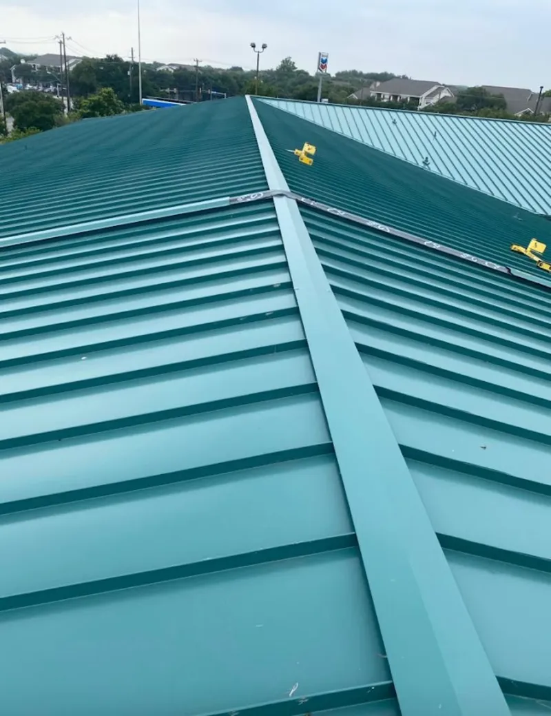 Green commercial metal roof ridge and valley for Metal Roof Repair in Crosspointe